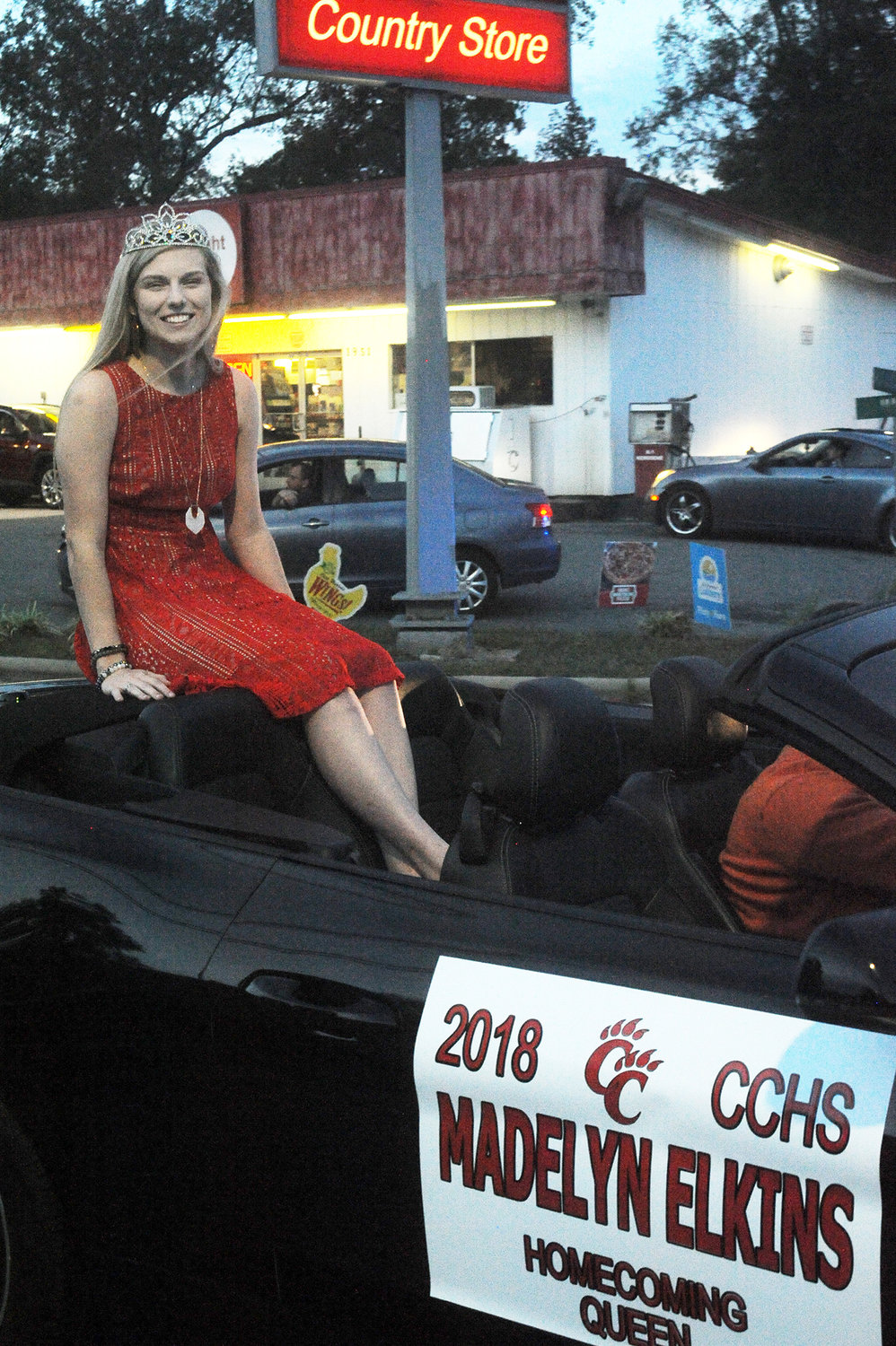 Chatham Central’s 2018 Homecoming Queen, Madelyn Elkins, rides near the beginning of the 2019 Parade through Goldston last Monday evening.